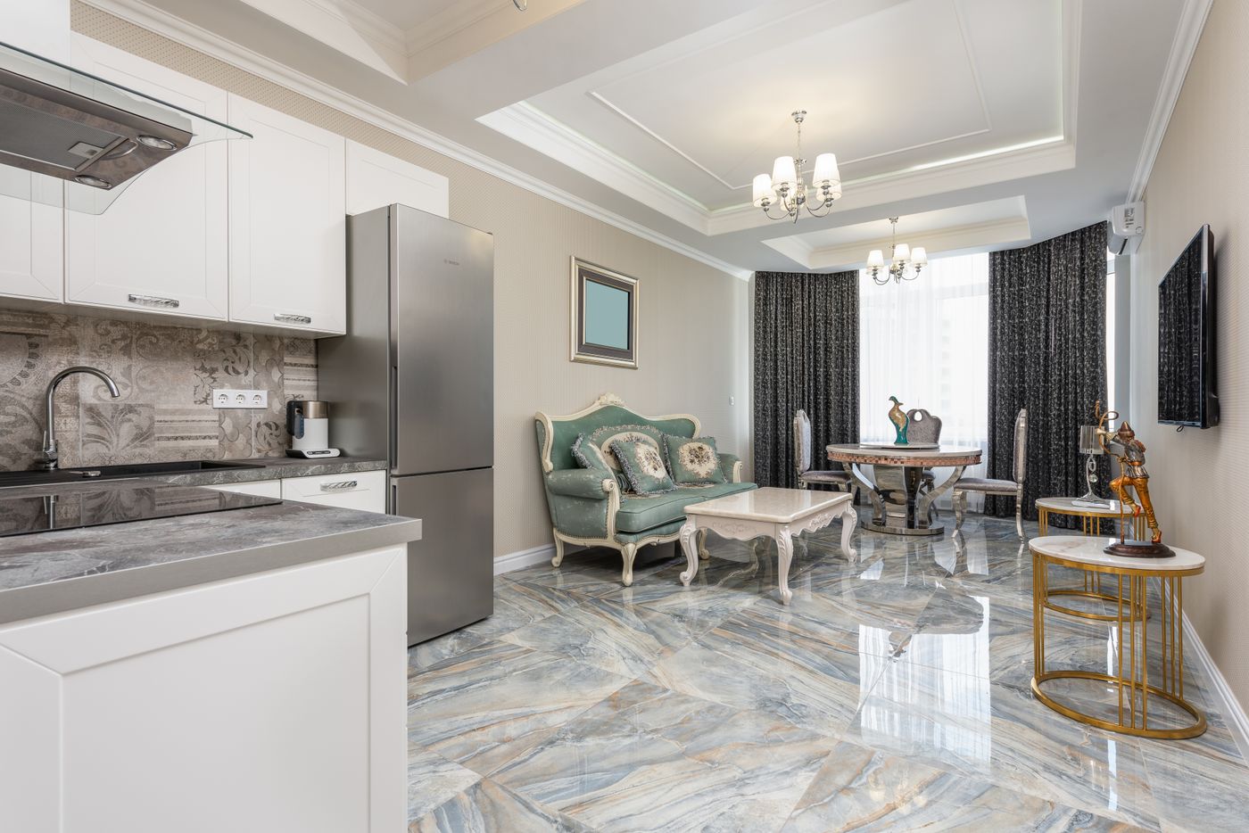 A cream and gold living and dining space